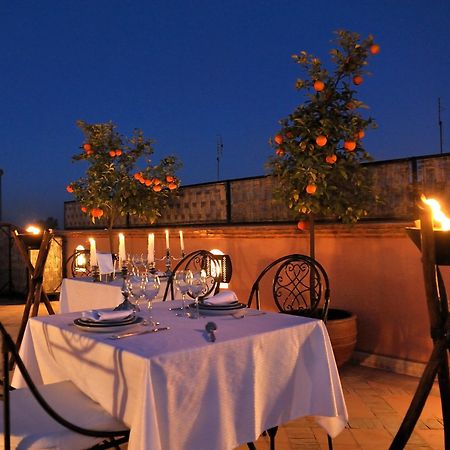 Riad Le Jardin D'Abdou Marrakesh Exterior photo Rooftop dining at the hotel