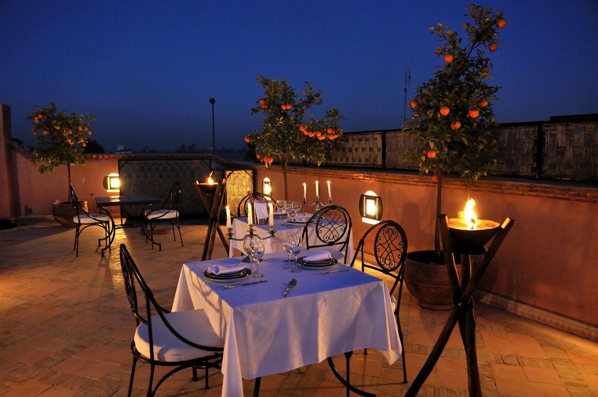 Riad Le Jardin D'Abdou Marrakesh Exterior photo Rooftop dining at the hotel
